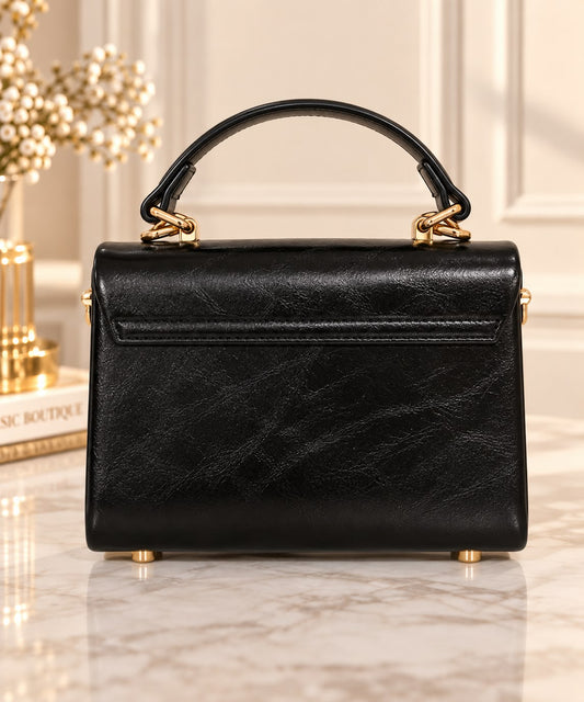 Geanta dama eleganta neagra cu accesorii aurii si maner