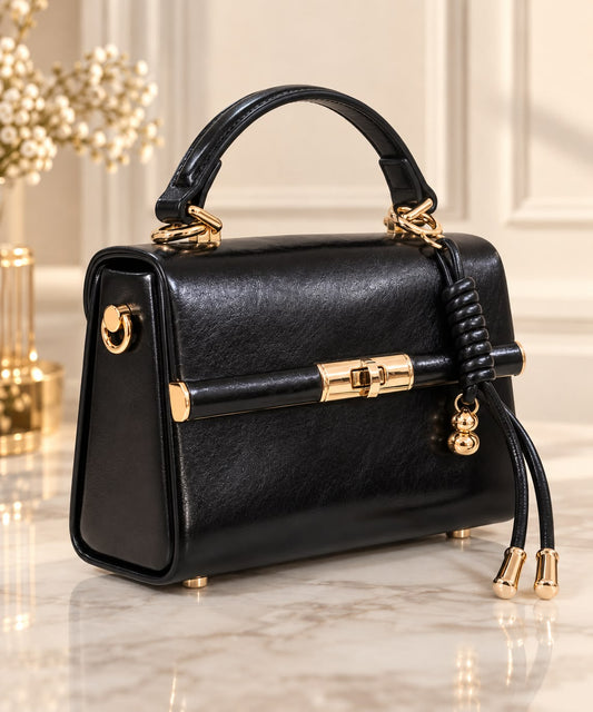 Geanta dama eleganta neagra cu accesorii aurii si maner